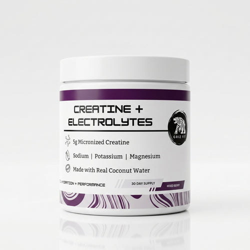 Container of creatine + electrolytes powder with purple and white design on a white background